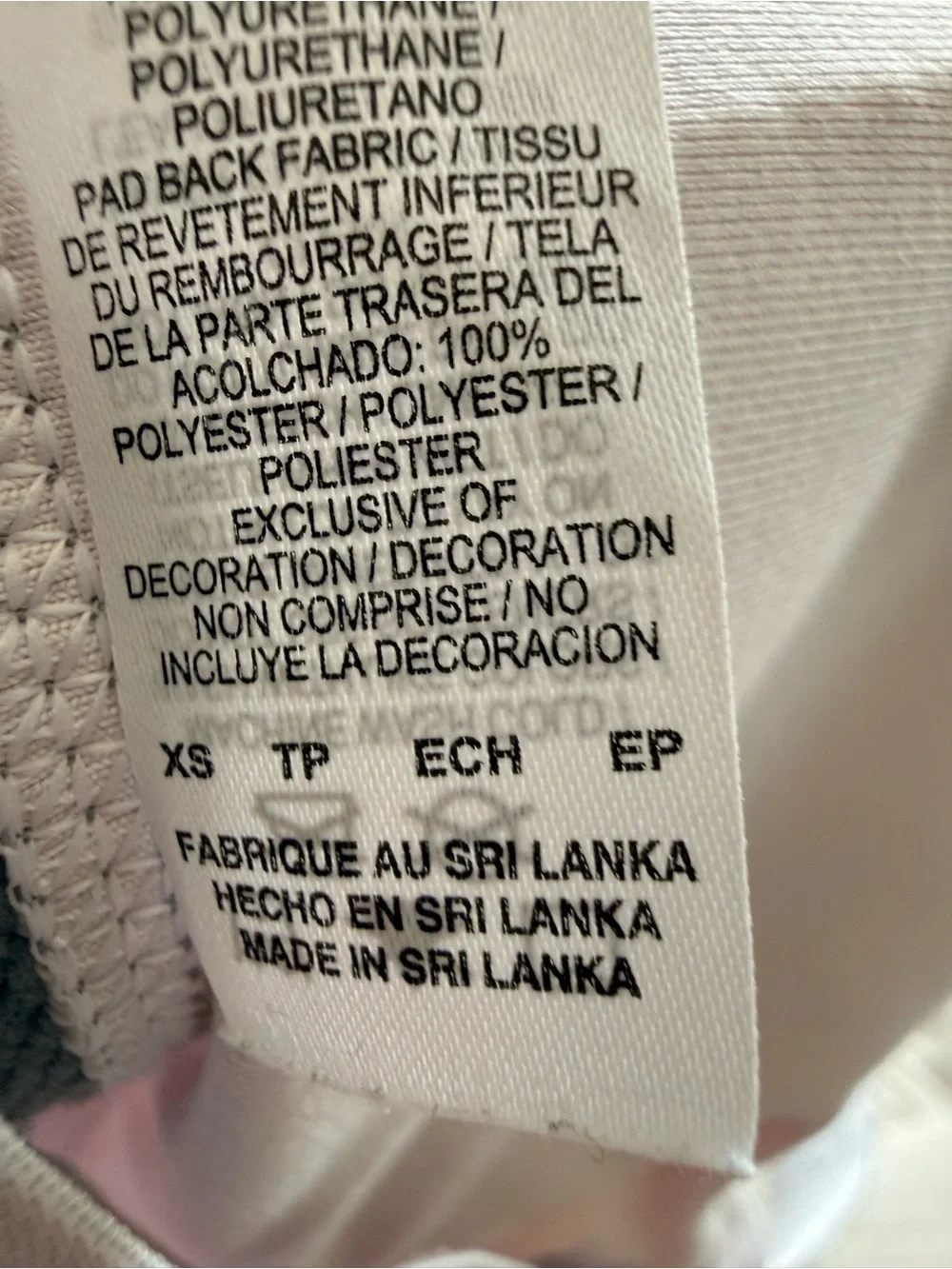 38. Nike Pink and Gray Cross-Back Sports Bra